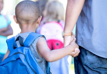boy-wearing-backpack-with-dad-2-900x0-c-default