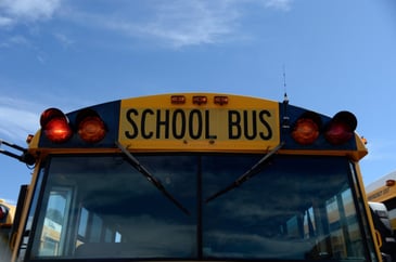 denver-post-school-bus-with-blue-sky-900x0-c-default